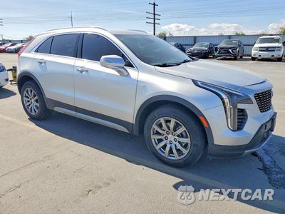Czwarte zdjęcie samochodu z boku: 2022 CADILLAC XT4 PREMIUM LUXURY VIN:1GYFZDR48NF102240 - miniatura