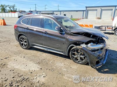 Czwarte zdjęcie samochodu z boku: 2018 BMW X1 XDRIVE28I VIN:WBXHT3C39J5K25851 - miniatura