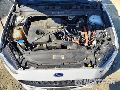 Zdjęcie 11 z 12 samochodu: 2013 FORD FUSION SE HYBRID VIN:3FA6P0LU9DR371626 - miniatura