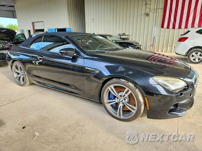 Czwarte zdjęcie samochodu z boku: 2014 BMW M6 VIN:WBSLZ9C56EDZ78770 - miniatura