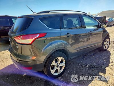 Trzecie zdjęcie samochodu z tyłu: 2016 FORD ESCAPE SE VIN:1FMCU9GX5GUA43403 - miniatura