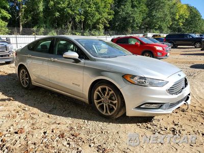 Czwarte zdjęcie samochodu z boku: 2017 FORD FUSION SE HYBRID VIN:3FA6P0LU9HR258572 - miniatura