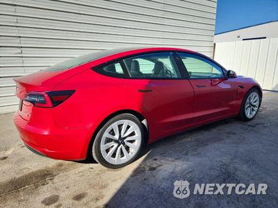 Trzecie zdjęcie samochodu z tyłu: 2022 TESLA MODEL 3 VIN:5YJ3E1EB2NF305104 - miniatura