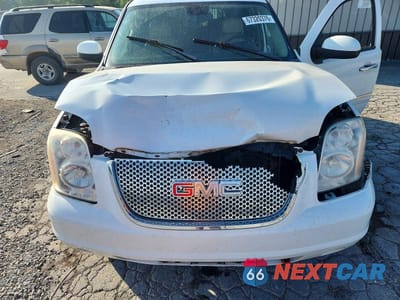 Zdjęcie 12 z 13 samochodu: 2009 GMC YUKON DENALI VIN:1GKFK03219J123836 - miniatura