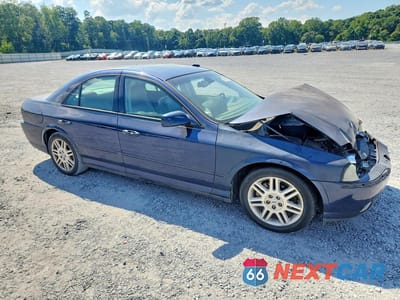 Czwarte zdjęcie samochodu z boku: 2003 LINCOLN LS VIN:1LNHM87A43Y657177 - miniatura