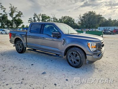 Czwarte zdjęcie samochodu z boku: 2022 FORD F150 SUPERCREW VIN:1FTEW1C51NFA61315 - miniatura