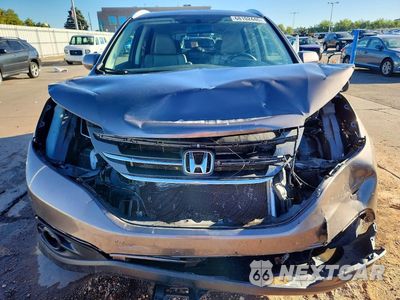 Piąte zdjęcie samochodu w środku: 2014 HONDA CR-V EXL VIN:2HKRM4H78EH623722 - miniatura