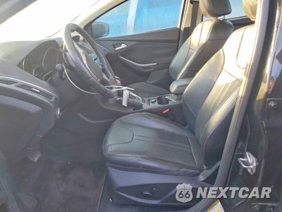 Zdjęcie 7 z 12 samochodu: 2014 FORD FOCUS TITANIUM VIN:1FADP3J25EL406642 - miniatura
