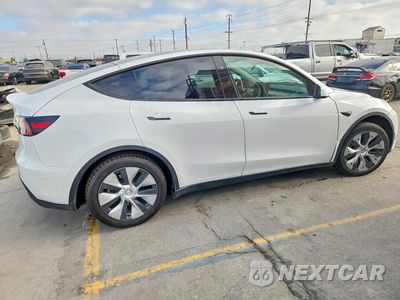 Trzecie zdjęcie samochodu z tyłu: 2024 TESLA MODEL Y VIN:7SAYGDED2RF035707 - miniatura