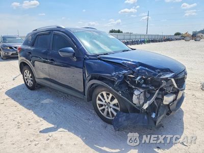 Czwarte zdjęcie samochodu z boku: 2014 MAZDA CX-5 SPORT VIN:JM3KE4BE3E0402264 - miniatura
