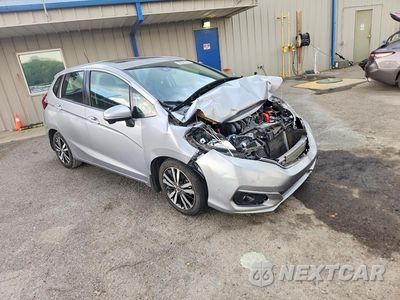 Czwarte zdjęcie samochodu z boku: 2018 HONDA FIT EX VIN:3HGGK5H89JM721353 - miniatura