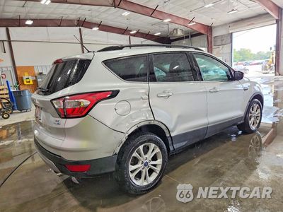 Trzecie zdjęcie samochodu z tyłu: 2018 FORD ESCAPE SE VIN:1FMCU9GD6JUB29638 - miniatura