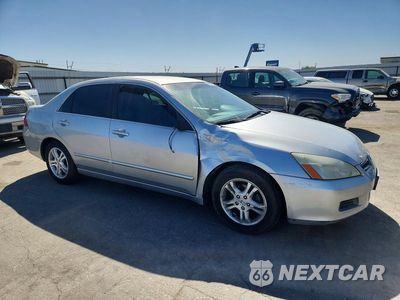 Czwarte zdjęcie samochodu z boku: 2007 HONDA ACCORD SE VIN:JHMCM56307C005576 - miniatura
