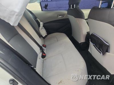 Zdjęcie 10 z 12 samochodu: 2021 TOYOTA COROLLA LE VIN:JTDEPMAE3MJ187477 - miniatura