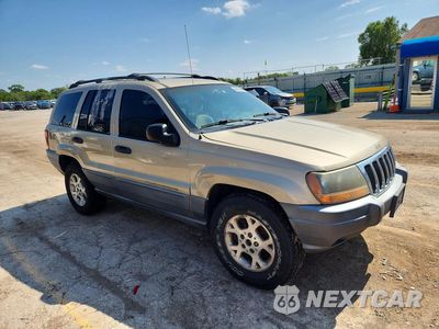 Czwarte zdjęcie samochodu z boku: 2001 JEEP GRAND CHEROKEE LAREDO VIN:1J4GW48S31C699192 - miniatura