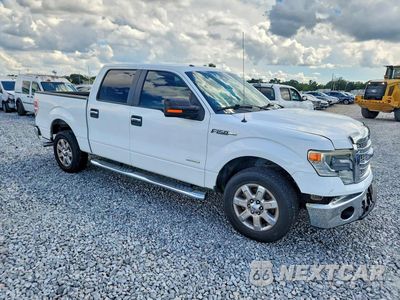 Czwarte zdjęcie samochodu z boku: 2014 FORD F150 SUPERCREW VIN:1FTFW1CT2EFA90633 - miniatura