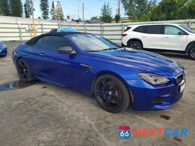Czwarte zdjęcie samochodu z boku: 2012 BMW M6 VIN:WBSLZ9C51CC985483 - miniatura