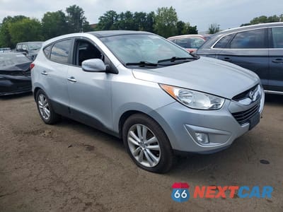 Czwarte zdjęcie samochodu z boku: 2010 HYUNDAI TUCSON LIMITED VIN:KM8JUCAC3AU024883 - miniatura