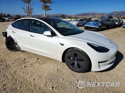 Czwarte zdjęcie samochodu z boku: 2023 TESLA MODEL 3 VIN:5YJ3E1EA1PF609289 - miniatura