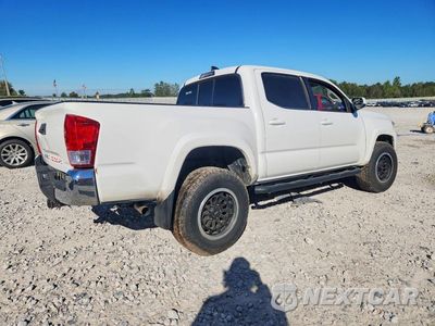 Trzecie zdjęcie samochodu z tyłu: 2017 TOYOTA TACOMA SR5 V6 VIN:3TMCZ5AN0HM097266 - miniatura