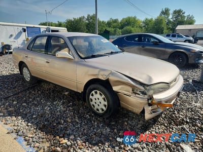 Czwarte zdjęcie samochodu z boku: 1995 TOYOTA CAMRY LE VIN:4T1SK12E1SU872390 - miniatura