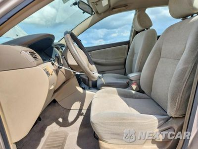 Zdjęcie 7 z 12 samochodu: 2003 TOYOTA COROLLA CE VIN:1NXBR32E43Z013951 - miniatura