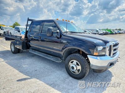 Czwarte zdjęcie samochodu z boku: 2001 FORD F350 SUPER DUTY VIN:1FTWW33F51EC52874 - miniatura