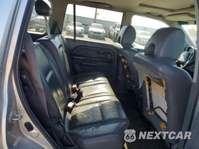 Zdjęcie 11 z 13 samochodu: 2005 HONDA PILOT EXL VIN:2HKYF18595H531330 - miniatura