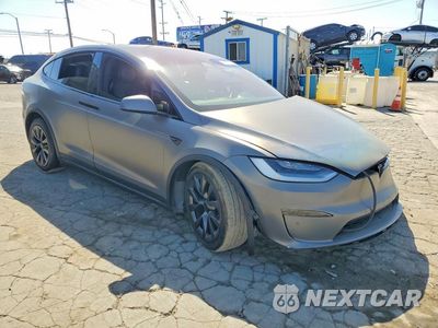 Czwarte zdjęcie samochodu z boku: 2022 TESLA MODEL X VIN:7SAXCBE6XNF332327 - miniatura
