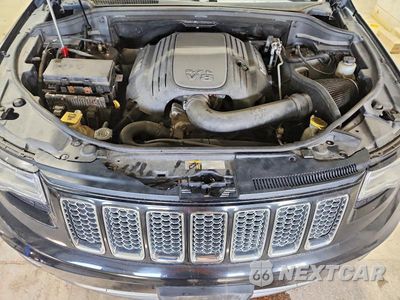 Zdjęcie 12 z 14 samochodu: 2015 JEEP GRAND CHEROKEE SUMMIT VIN:1C4RJFJT3FC861714 - miniatura