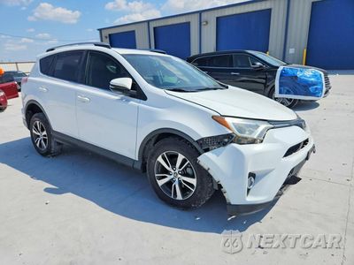 Czwarte zdjęcie samochodu z boku: 2018 TOYOTA RAV4 XLE VIN:JTMWFREV8JD109530 - miniatura