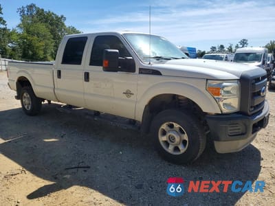 Czwarte zdjęcie samochodu z boku: 2014 FORD F350 SUPER DUTY VIN:1FT8W3BT4EEB15169 - miniatura