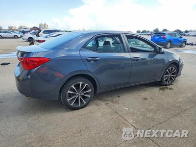 Trzecie zdjęcie samochodu z tyłu: 2017 TOYOTA COROLLA SE VIN:5YFBURHE8HP710606 - miniatura