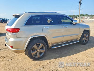 Trzecie zdjęcie samochodu z tyłu: 2014 JEEP GRAND CHEROKEE OVERLAND VIN:1C4RJFCT8EC162123 - miniatura