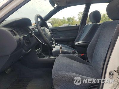 Zdjęcie 7 z 12 samochodu: 1995 TOYOTA COROLLA DX VIN:1NXAE09B7SZ305917 - miniatura