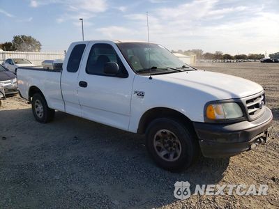Czwarte zdjęcie samochodu z boku: 2003 FORD F150 VIN:2FTPX17Z43CA64401 - miniatura