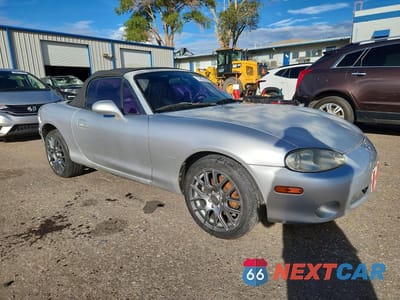 Czwarte zdjęcie samochodu z boku: 2001 MAZDA MX-5 MIATA BASE VIN:JM1NB353510204069 - miniatura