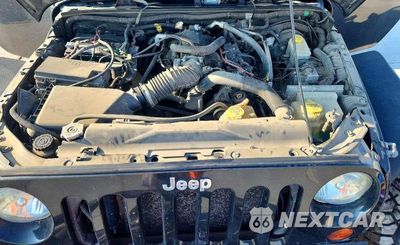 Zdjęcie 11 z 12 samochodu: 2009 JEEP WRANGLER UNLIMITED SAHARA VIN:1J4GA59149L760569 - miniatura