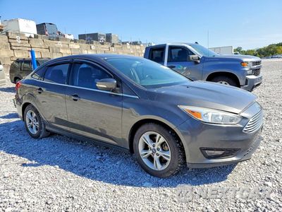 Czwarte zdjęcie samochodu z boku: 2015 FORD FOCUS TITANIUM VIN:1FADP3J20FL379710 - miniatura