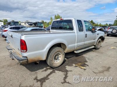 Trzecie zdjęcie samochodu z tyłu: 2001 FORD F250 SUPER DUTY VIN:1FTNX20FX1EA65718 - miniatura