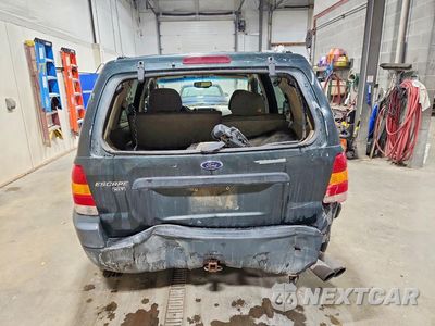 Zdjęcie 6 z 13 samochodu: 2003 FORD ESCAPE XLT VIN:1FMCU93153KA62279 - miniatura