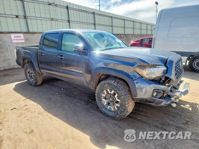 Czwarte zdjęcie samochodu z boku: 2023 TOYOTA TACOMA TRD OFF-ROAD VIN:3TMCZ5AN5PM591931 - miniatura