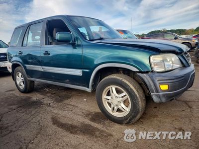 Czwarte zdjęcie samochodu z boku: 1999 HONDA CR-V EX VIN:JHLRD1863XC036979 - miniatura