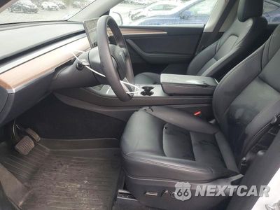 Zdjęcie 7 z 12 samochodu: 2024 TESLA MODEL Y VIN:7SAYGAEE5RF161390 - miniatura