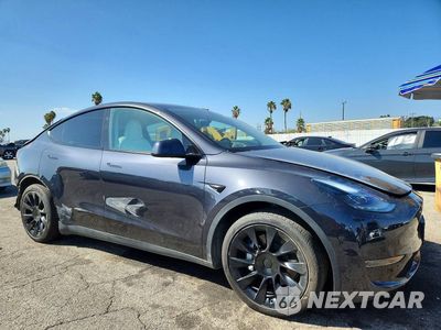Czwarte zdjęcie samochodu z boku: 2024 TESLA MODEL Y VIN:7SAYGDED7RF050154 - miniatura