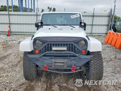 Piąte zdjęcie samochodu w środku: 2011 JEEP WRANGLER UNLIMITED SAHARA VIN:1J4BA5H16BL604356 - miniatura