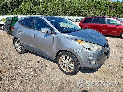 Czwarte zdjęcie samochodu z boku: 2011 HYUNDAI TUCSON LIMITED VIN:KM8JU3AC9BU187958 - miniatura