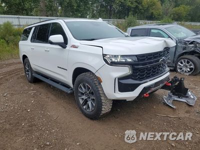 Czwarte zdjęcie samochodu z boku: 2023 CHEVROLET SUBURBAN K1500 Z71 VIN:1GNSKDKD5PR284894 - miniatura