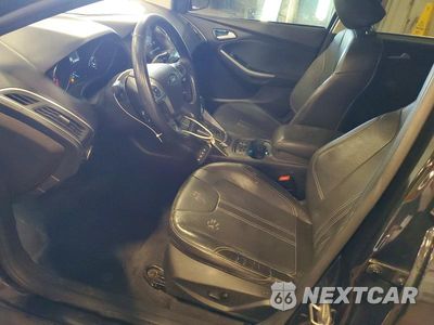 Zdjęcie 7 z 12 samochodu: 2014 FORD FOCUS TITANIUM VIN:1FADP3N22EL258900 - miniatura
