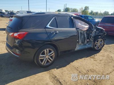 Trzecie zdjęcie samochodu z tyłu: 2018 CHEVROLET EQUINOX PREMIER VIN:3GNAXMEV4JL124991 - miniatura